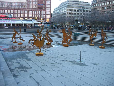 Rörliga dansfigurer av cortenstål